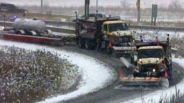 Archive image of road maintenance crews doing winter highway clean-up