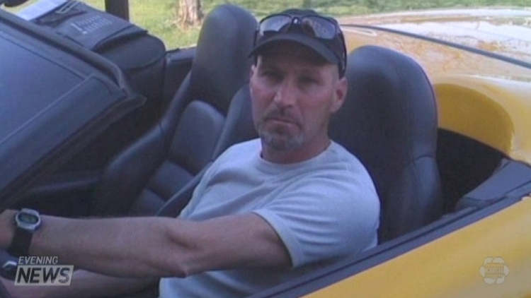 Donald Dubuc in his Corvette