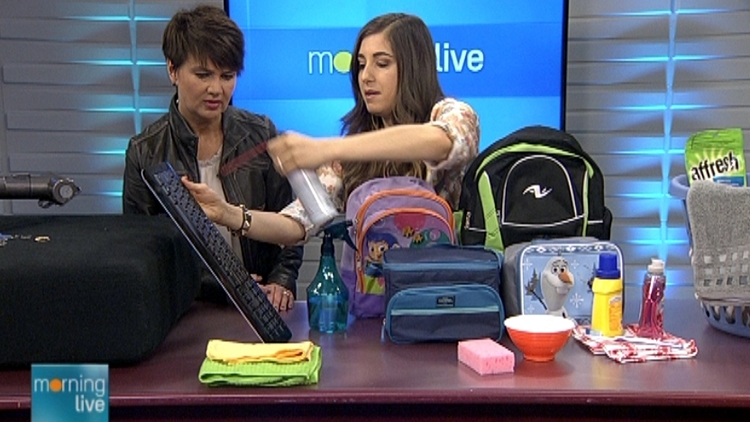 Annette Hamm watches Melissa Maker clean a keyboard; Morning Live, June 1, 2015