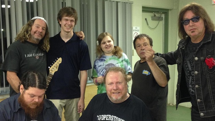 Courtney Balak (centre) with members of Teenage Head