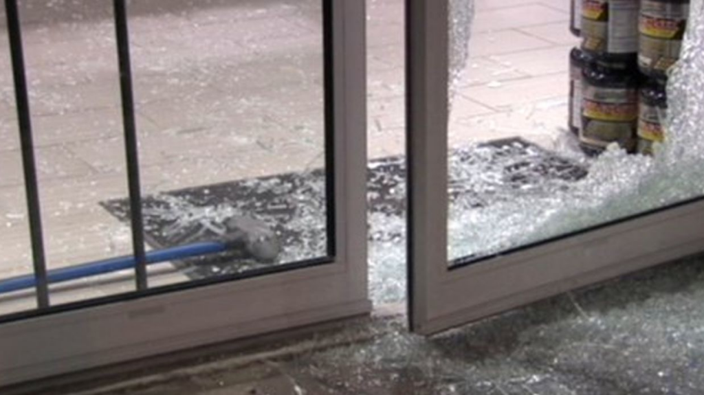 broken glass at Supplement King entrance