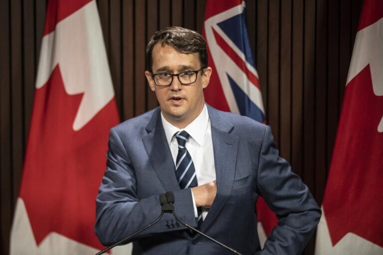 Ontario Labour Minister Monte McNaughton takes to the podium during a news conference in Toronto on Wednesday April 28, 2021.